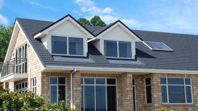 Brick home, with CF Slate, steel roof